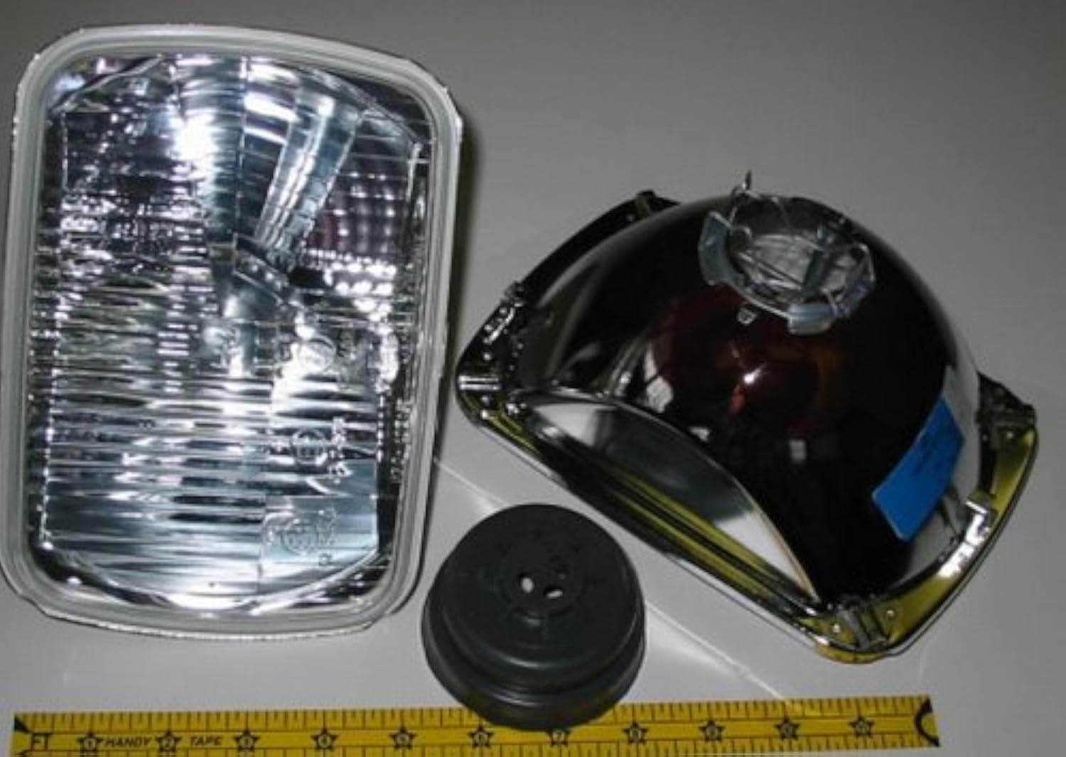 Hella 200mm Rectangular E Code H4 Halogen Replacement Headlight Kit with 100/55W H4 Bulbs