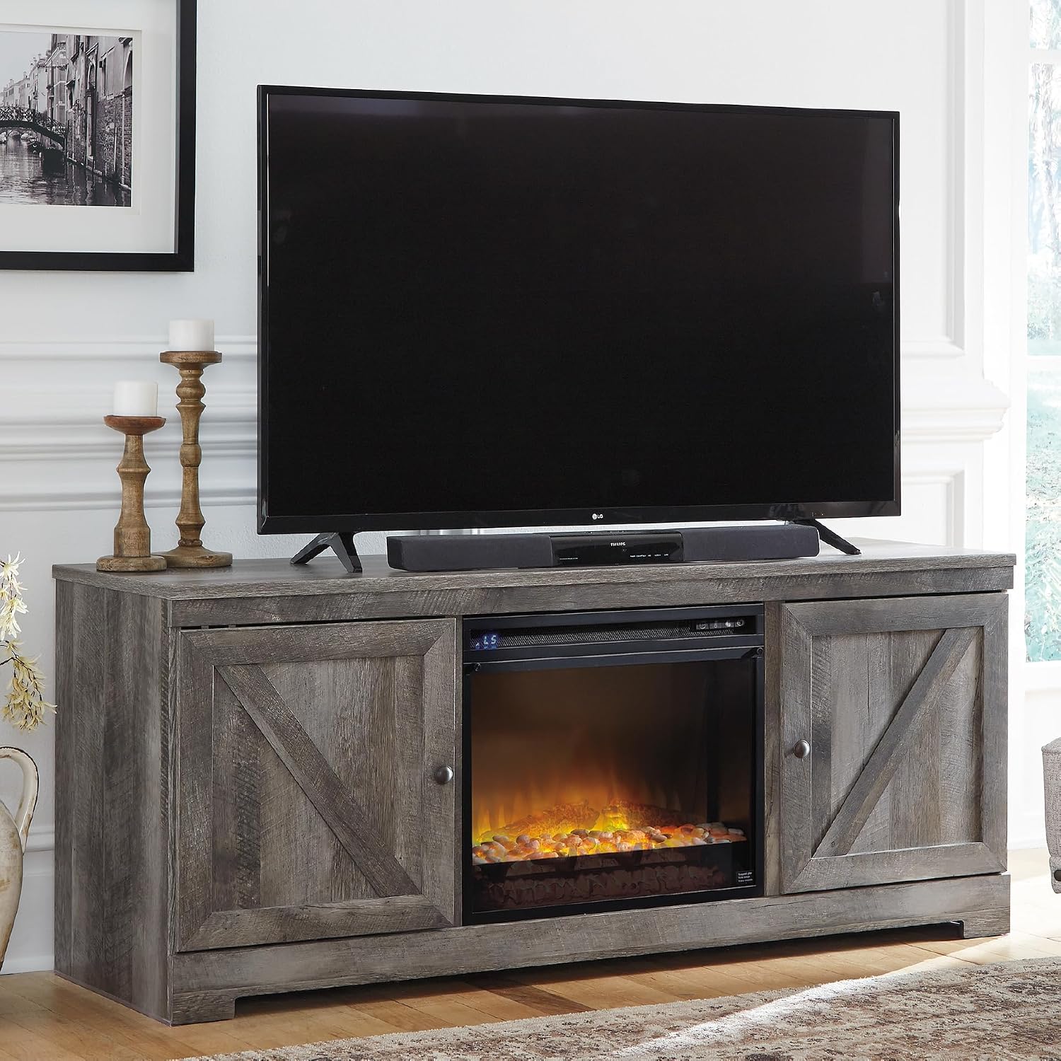 Signature Design by Ashley Wynnlow Farmhouse 63' TV Stand for TVs up to 72' with Electric Fireplace, Light Gray